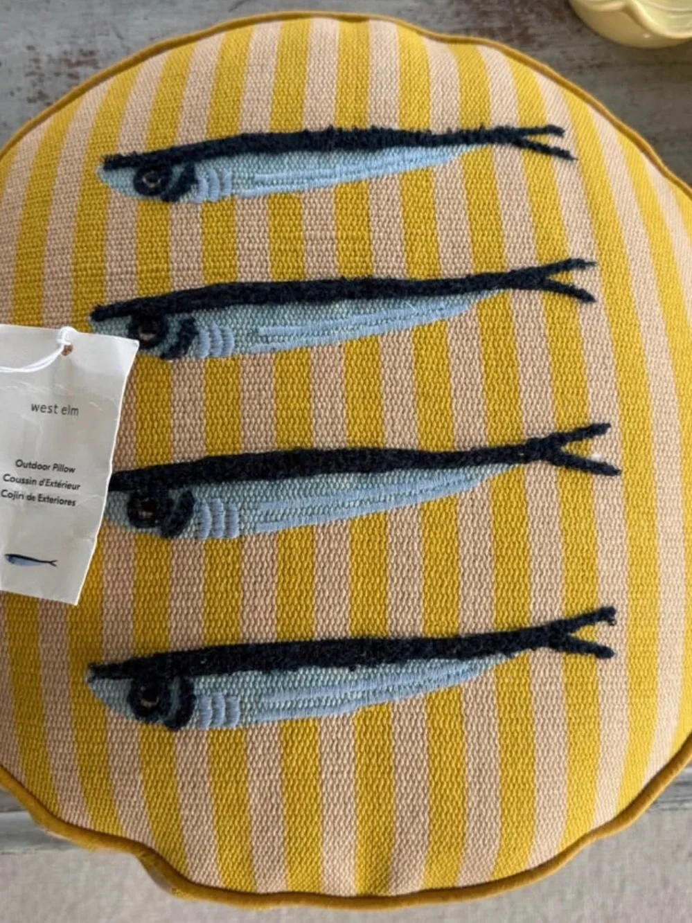 BRAND NEW West Elm Yellow Striped Round Pillow with Blue Sardine Motif